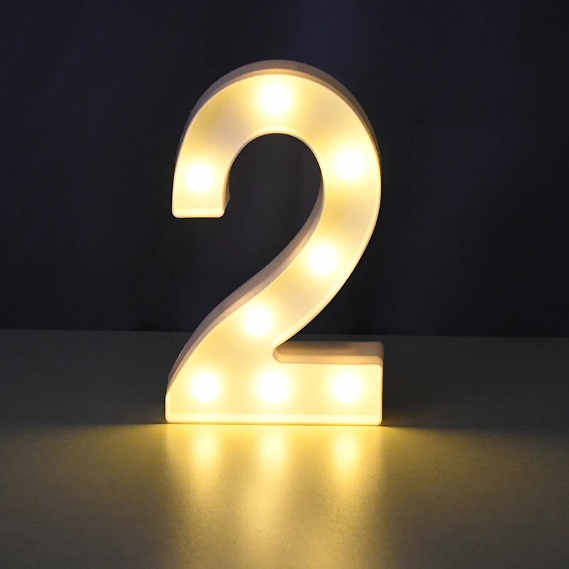 Number 2 nightlamp illuminated by yellow LED's on a black background