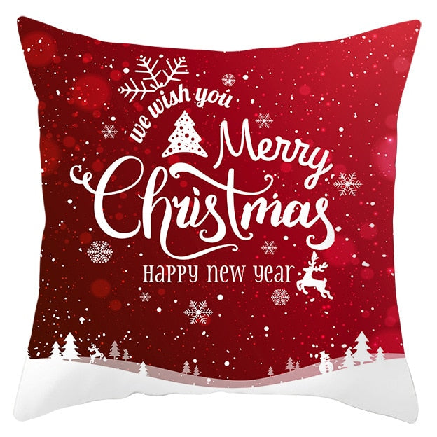 45cm by 45cm red pillowcase with drifting snow and falling flakes and reads "Merry Christmas Happy New Year"