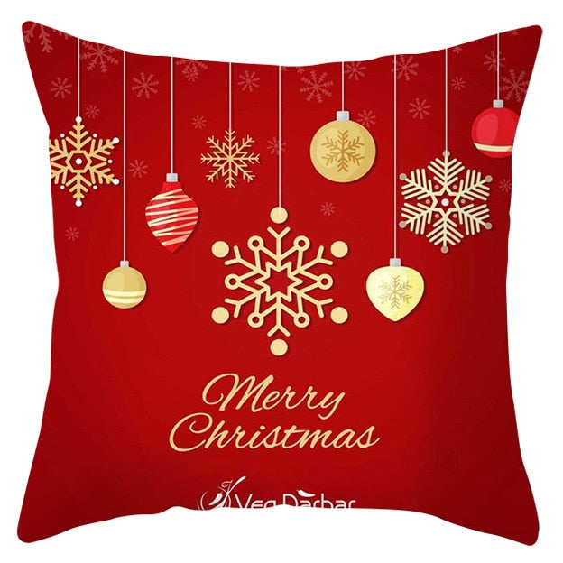 45cm by 45cm red pillowcase with red and gold Christmas balls and snowflakes and reads "Merry Christmas"