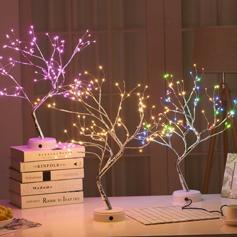 108 warm white, pink, and multicolor LED mini Cristmas tree night light on table in dark room