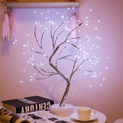 108 white LED mini Cristmas tree night light on cafe table in semilit room