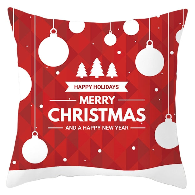 45cm by 45cm red pillowcase with white Christmas balls and reads "HAPPY HOLIDAYS MERRY CHRISTMAS AND A HAPPY NEW YEAR"