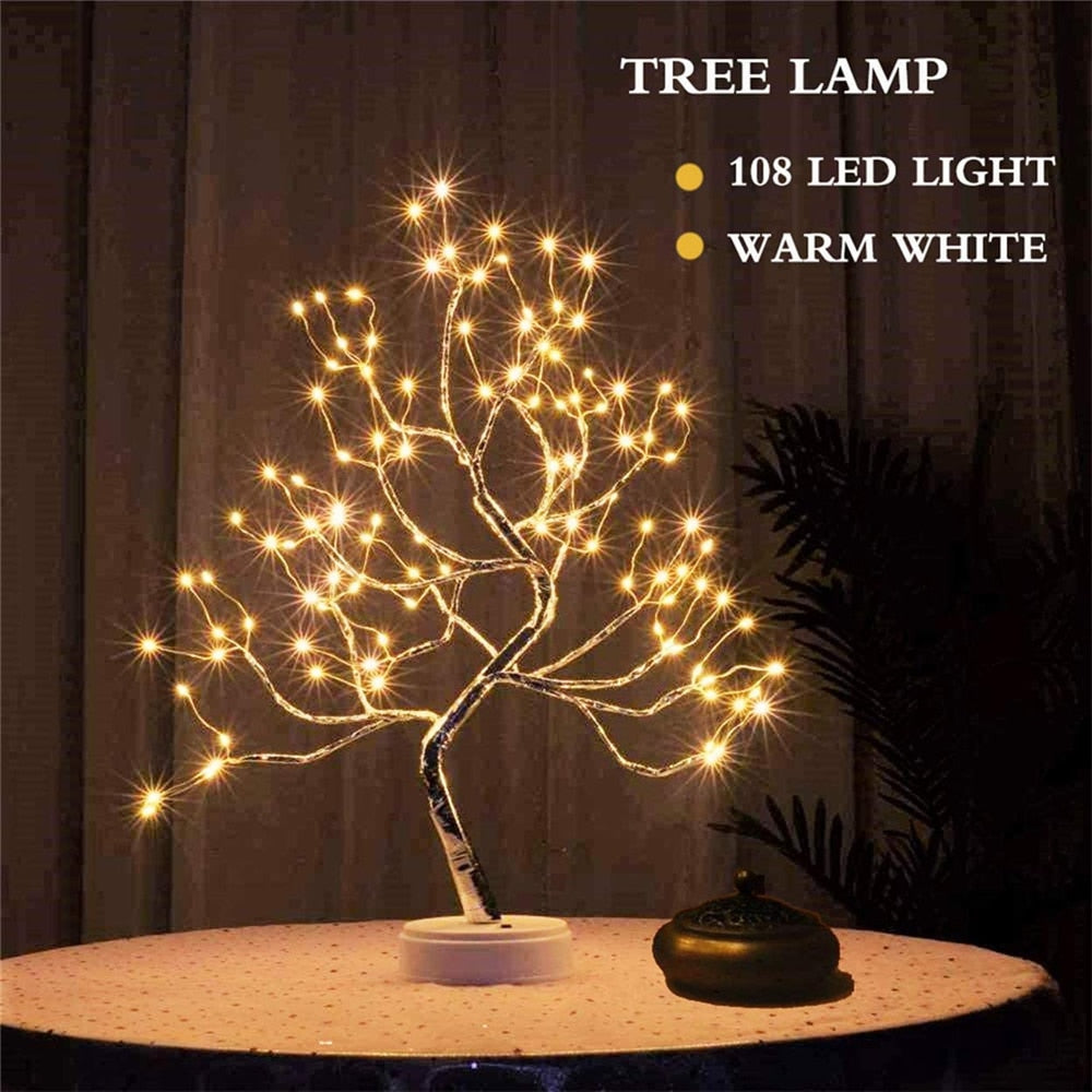 108 warm white LED mini Cristmas tree night light on table in dark room