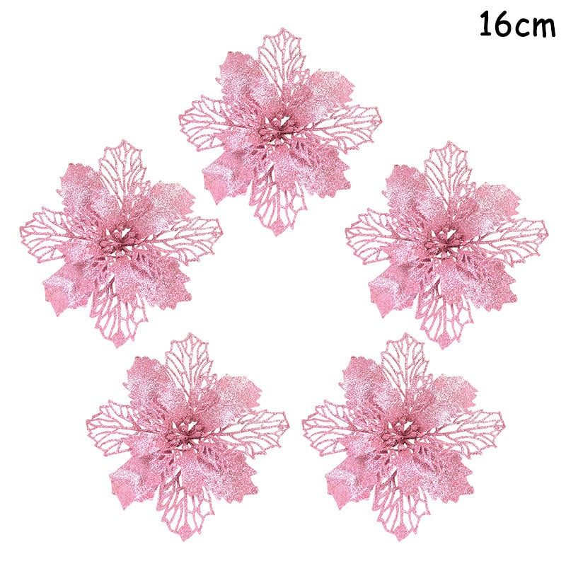 Five 14cm light pink artificial Christmas flowers on a white background