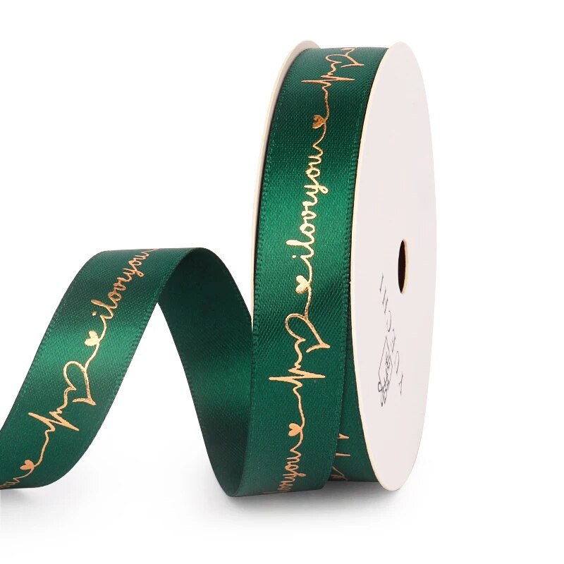 Green ribbon that reads I love you on a white background