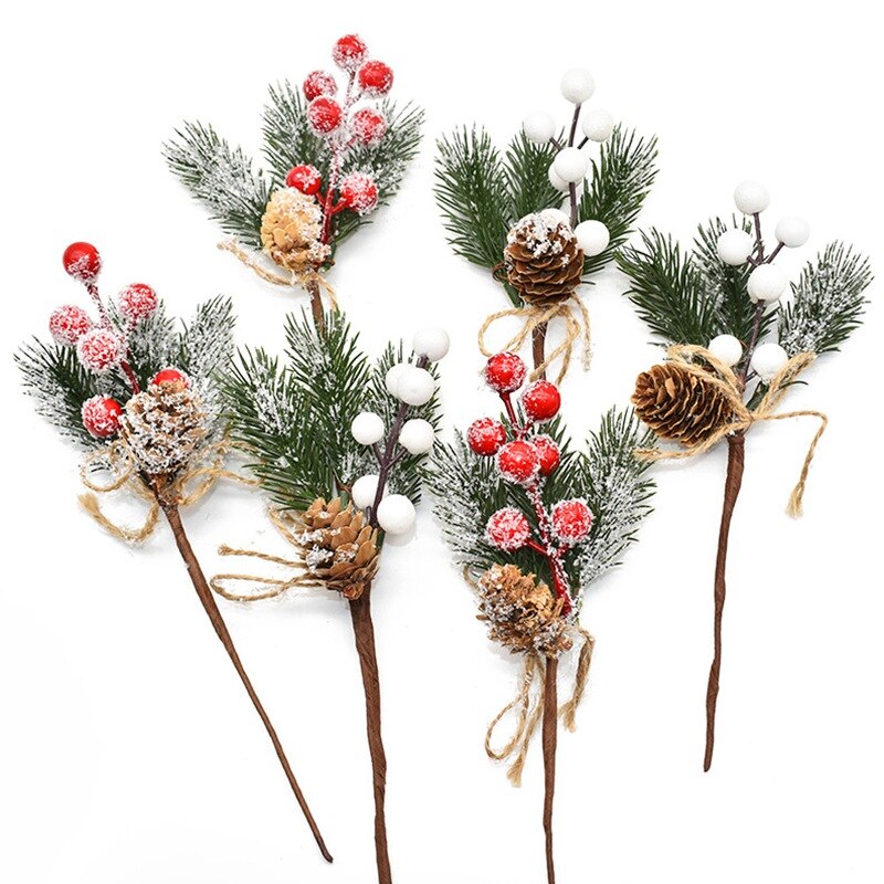 3, 22cm by 7.5cm artificial wreathe/garland addition with 3 snowdusted evergreen leaves, a light brown pine cone with red berries and 3 of the same pieces with white berries on a white background.