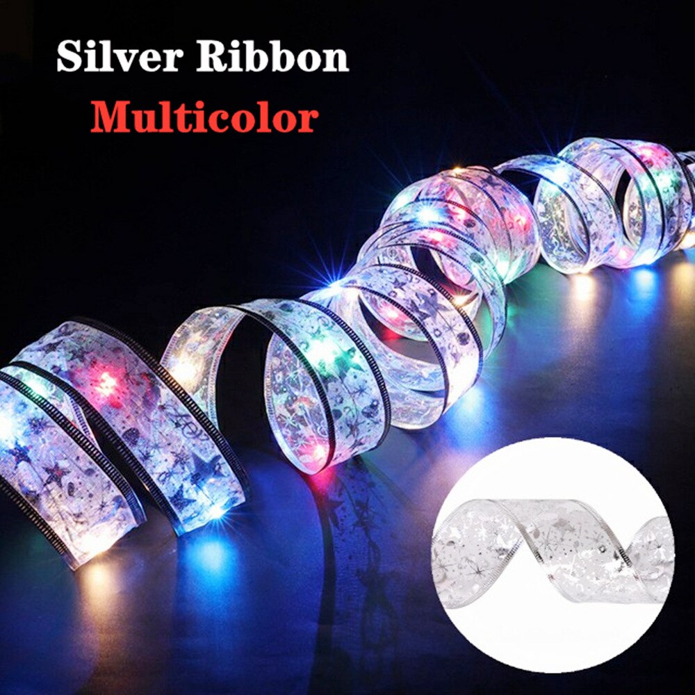 Coil of multicolor illuminated silver ribbon in a dark room