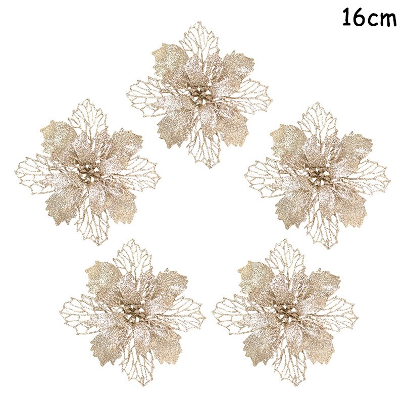 Five 14cm cream colored artificial Christmas flowers on a white background