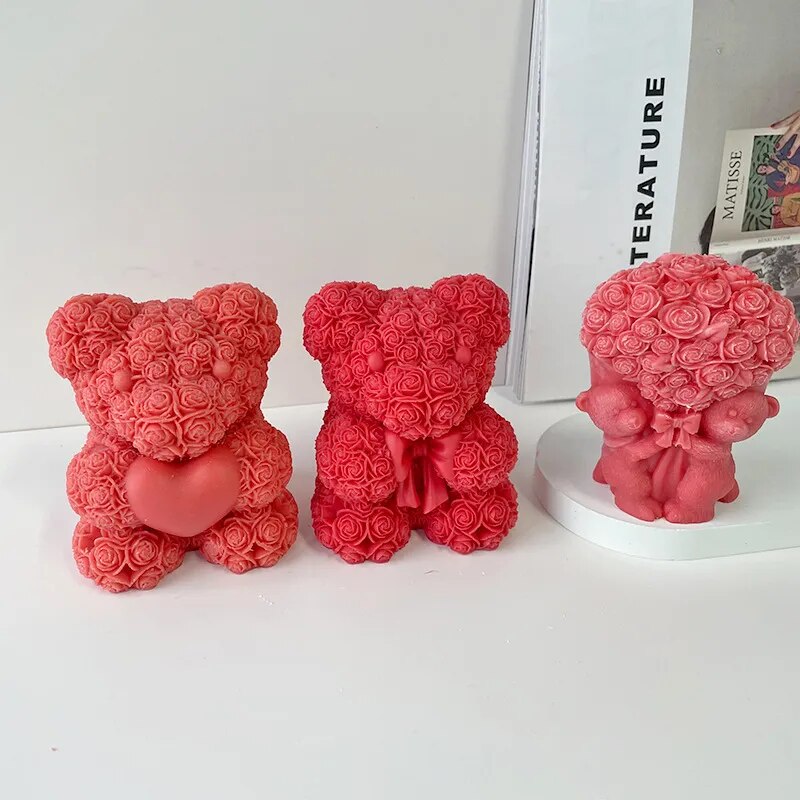  Two red chocolate molded bears on white background