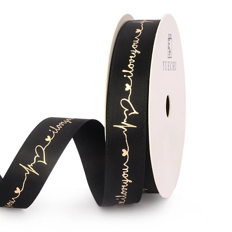 Black ribbon that reads I love you on a white background