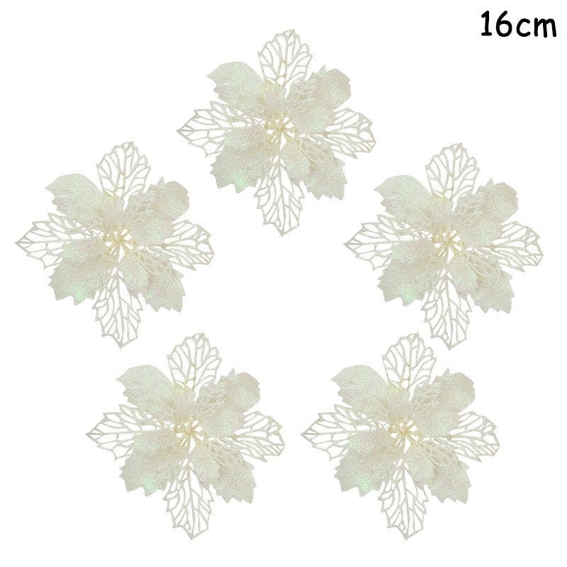 Five 14cm cream colored artificial Christmas flowers on a white background