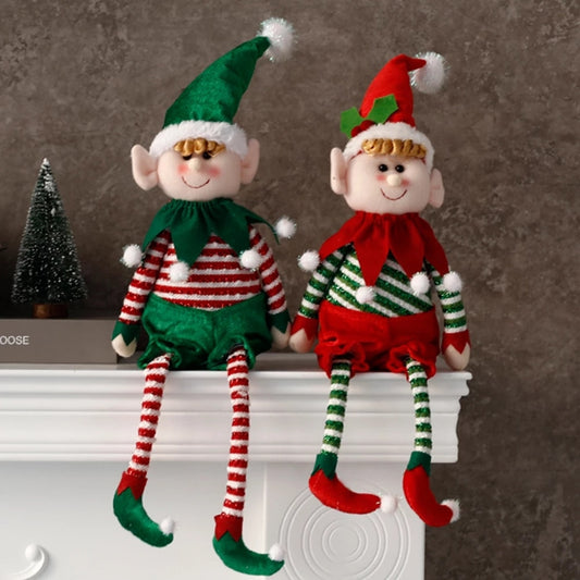 57cm by 30 cm red and green Chrismas elf sitting on white mantle together